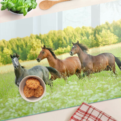 Planche à découper verre Une rencontre de chevaux dans le champ