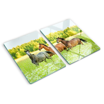 Planche à découper verre Une rencontre de chevaux dans le champ
