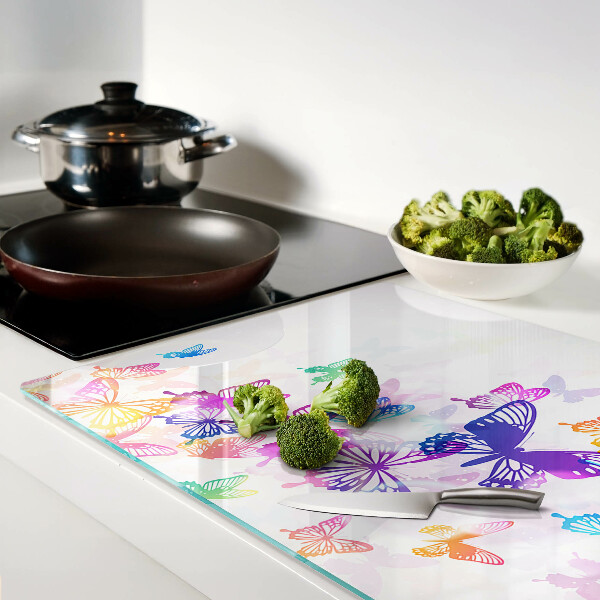 Planche à découper verre Un motif de papillons colorés s'envolant