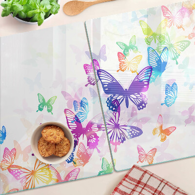 Planche à découper verre Un motif de papillons colorés s'envolant