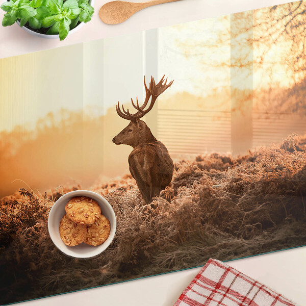 Planche à découper en verre Cerf sur fond de coucher de soleil