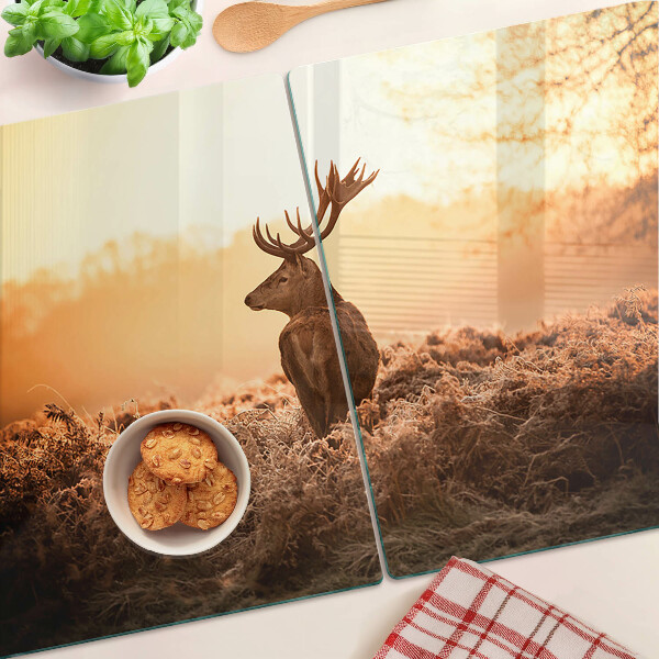 Planche à découper en verre Cerf sur fond de coucher de soleil