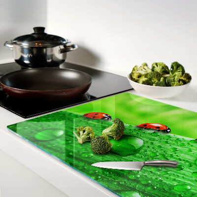Planche à découper verre Coccinelles sur fond vert
