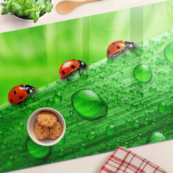 Planche à découper verre Coccinelles sur fond vert