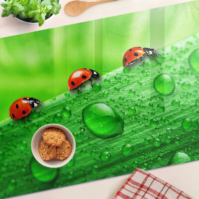 Planche à découper verre Coccinelles sur fond vert