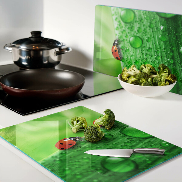 Planche à découper verre Coccinelles sur fond vert