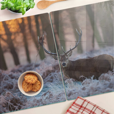 Planche à découper en verre Cerf dans la forêt d'hiver
