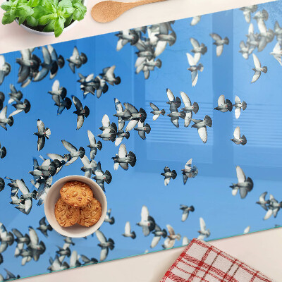 Planche à découper verre Pigeons volant dans le ciel