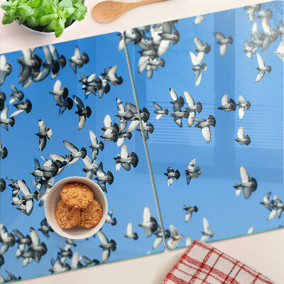 Planche à découper verre Pigeons volant dans le ciel