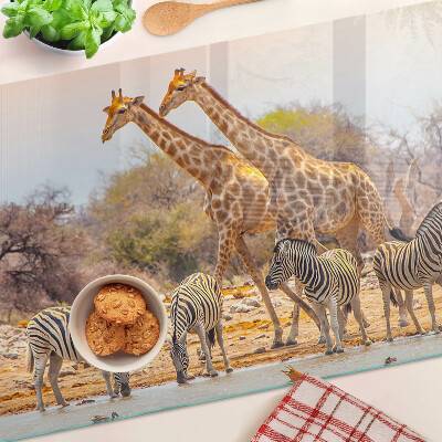 Planche à découper en verre Zèbre et girafe dans leur habitat naturel