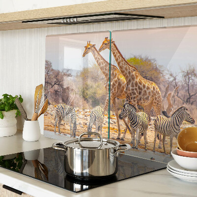 Planche à découper en verre Zèbre et girafe dans leur habitat naturel