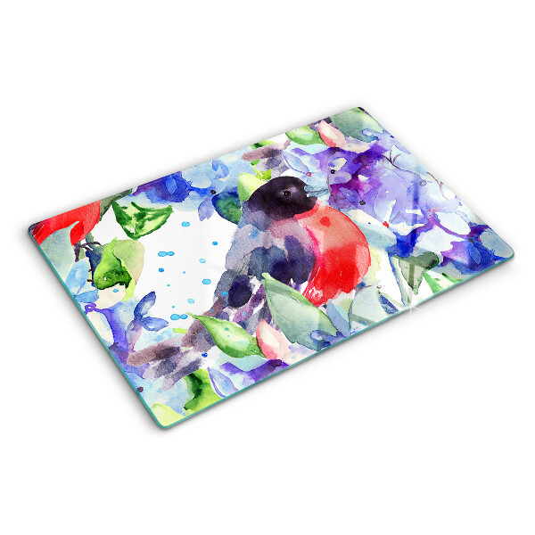 Planche à découper en verre Un oiseau sur fond de fleurs