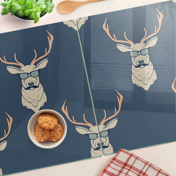 Planche à découper verre Renne avec des lunettes de soleil