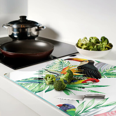 Planche à découper en verre Oiseaux et feuilles tropicales