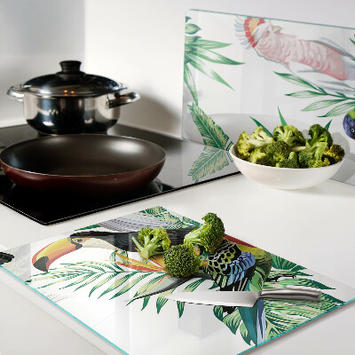 Planche à découper en verre Oiseaux et feuilles tropicales
