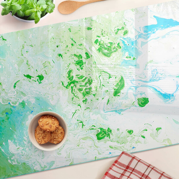 Planche à découper en verre Tourbillons abstraits en vert et bleu