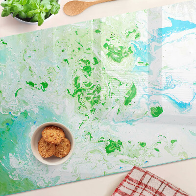 Planche à découper en verre Tourbillons abstraits en vert et bleu