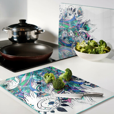 Planche à découper verre Plumes de paon en vert et bleu