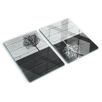Planche à découper en verre Un arbre sur un fond de briques