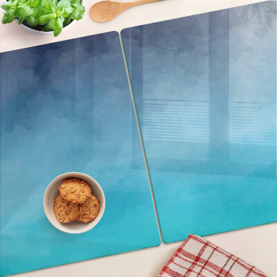 Planche à découper en verre Brouillard transparent dans des tons bleus