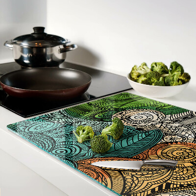 Planche à découper verre Motif mandala aux motifs colorés