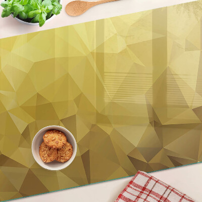 Planche à découper verre Géométrie dans les tons d'or