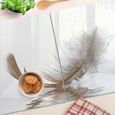Planche à découper verre Une plume contre l'eau