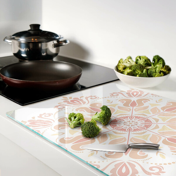 Planche à découper en verre Mandala dans les tons de rose