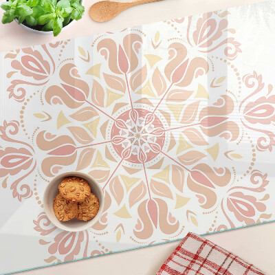 Planche à découper en verre Mandala dans les tons de rose