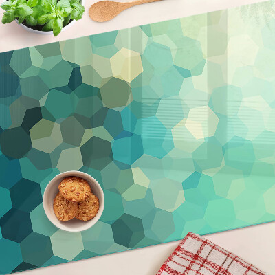 Planche à découper en verre Hexagones géométriques dans des tons de bleu