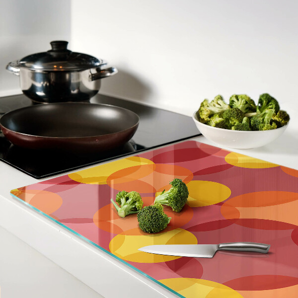 Planche à découper en verre Cercles colorés aux tons chauds