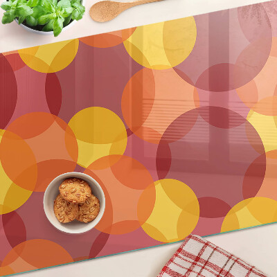 Planche à découper en verre Cercles colorés aux tons chauds