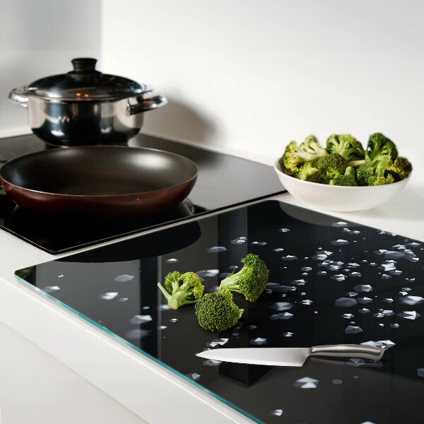 Planche à découper en verre Bulles de cristal sur fond noir