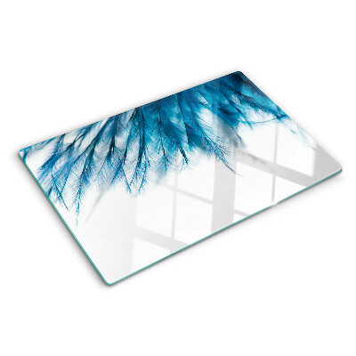 Planche à découper en verre Plumes bleues sur fond blanc