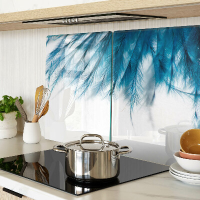 Planche à découper en verre Plumes bleues sur fond blanc