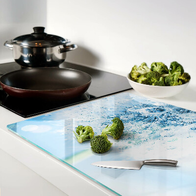 Planche à découper verre Fleur de pissenlit avec des gouttes d'eau