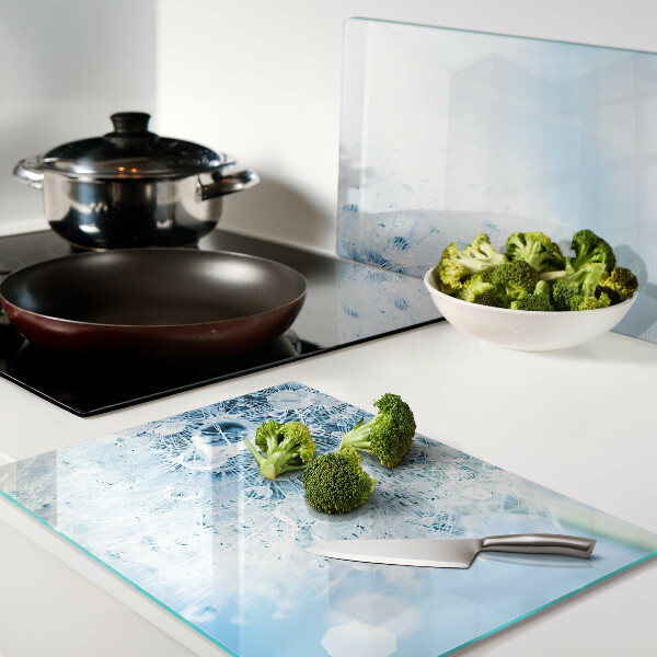 Planche à découper verre Fleur de pissenlit avec des gouttes d'eau