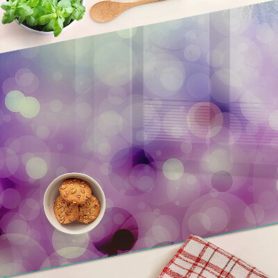 Planche à découper verre Bokeh dans les tons violet et rose