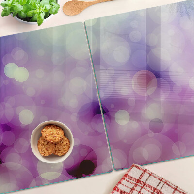 Planche à découper verre Bokeh dans les tons violet et rose