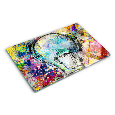 Planche à découper en verre Ampoule sur fond coloré