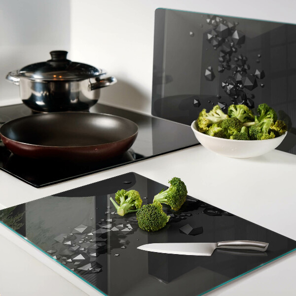 Planche à découper en verre Cristaux noirs sur le fond