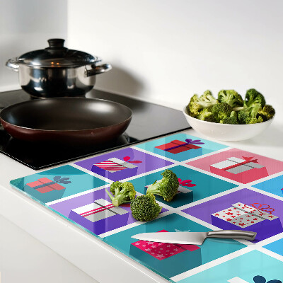 Planche à découper verre Motifs cadeaux de différentes couleurs