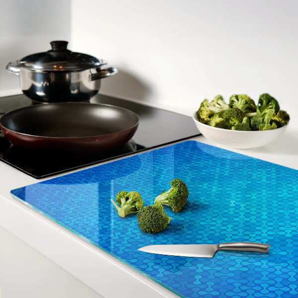Planche à découper verre Un motif ondulé dans des tons de bleu