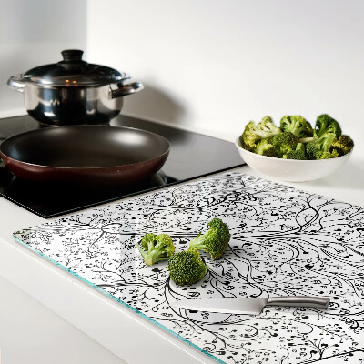 Planche à découper en verre Un motif végétal aux branches délicates