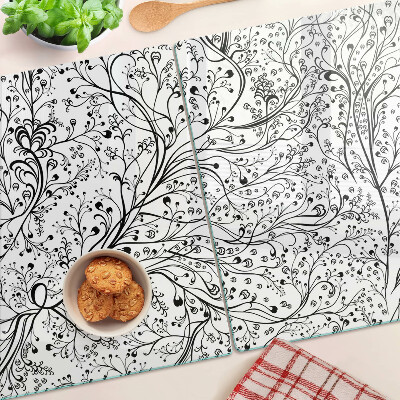 Planche à découper en verre Un motif végétal aux branches délicates