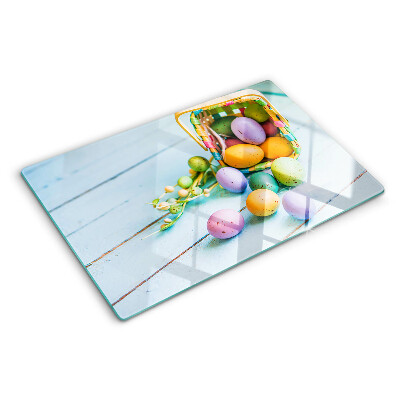 Planche à découper en verre Oeufs de Pâques colorés dans un panier
