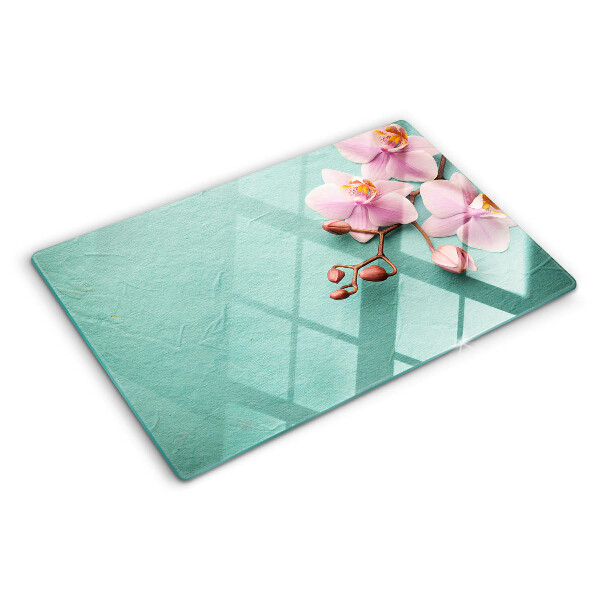 Planche à découper verre Orchidées sur fond bleu