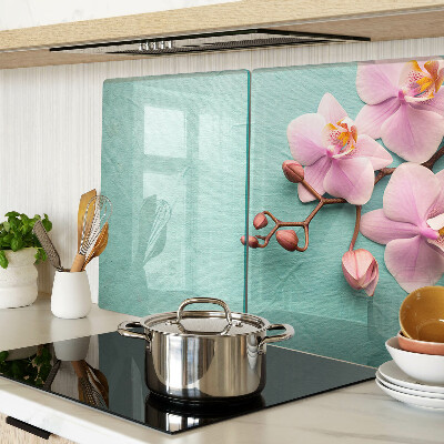 Planche à découper verre Orchidées sur fond bleu
