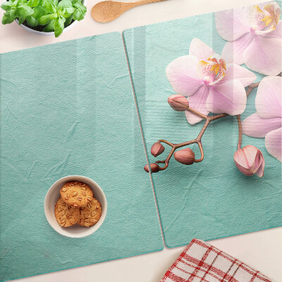 Planche à découper verre Orchidées sur fond bleu
