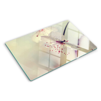 Planche à découper en verre Fleurs sur fond géométrique